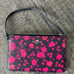 Coach wristlet. Navy and Pink floral.  New.